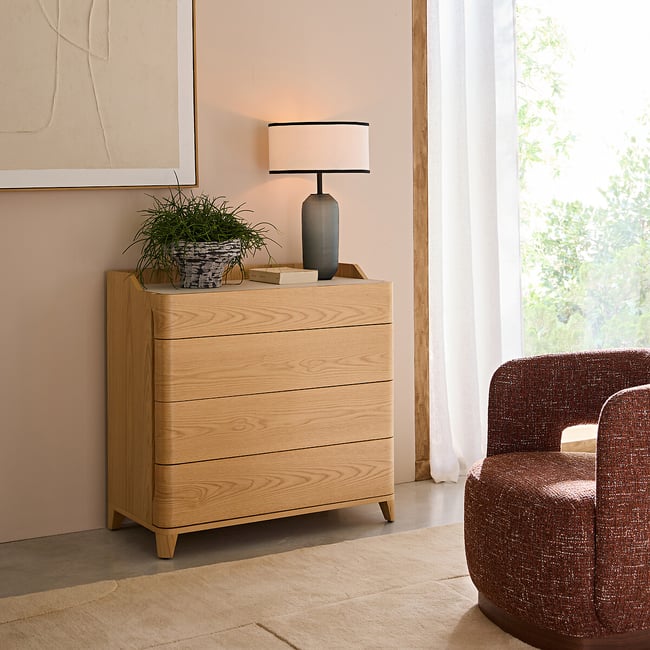 Junius chest of drawers in oak veneer and leather, designed by