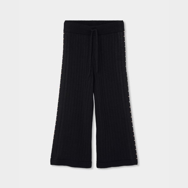 Pantalon fille avec clous noir <span itemprop=
