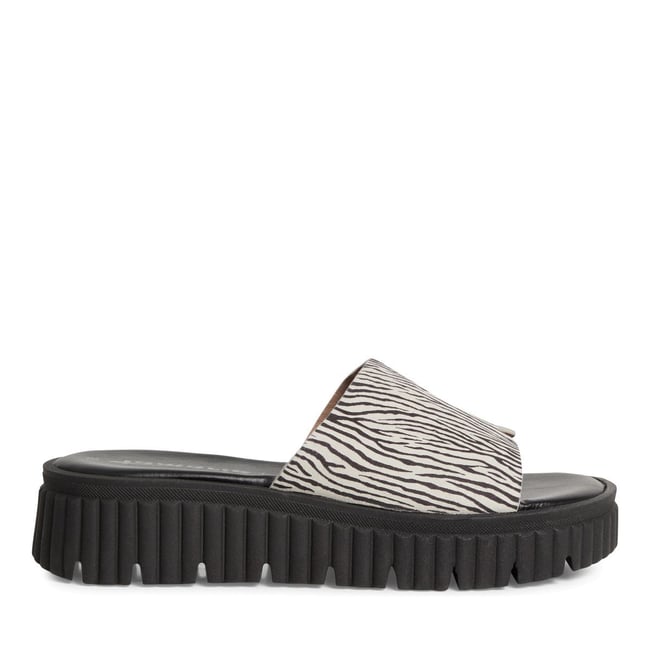 Mule en cuir zèbre <span itemprop=