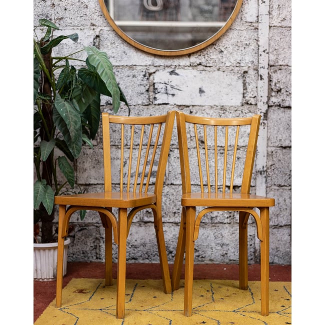 Paire de chaises Baumann Alma N°2128 - Bon état Couleur bois clair <span itemprop=