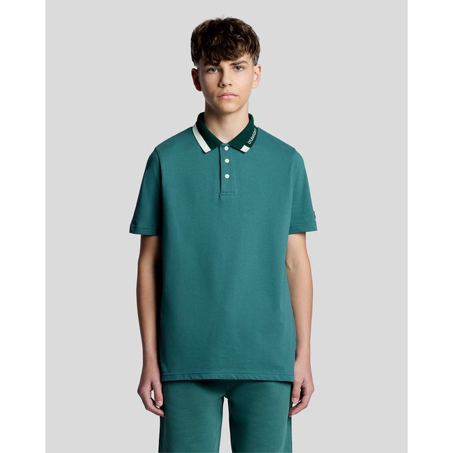 Polo à liserés contrastés logo vert everglade <span itemprop=