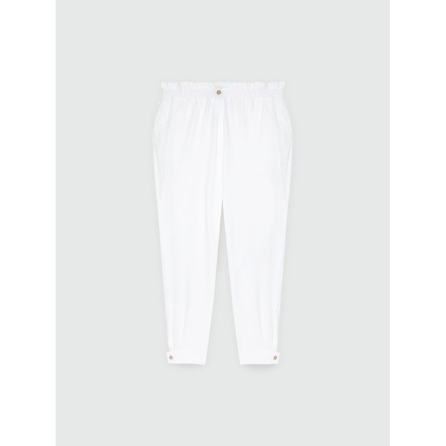 Pantalon en jersey piqué avec broderie en résille et paillettes le long des jambes blanc <span itemprop=