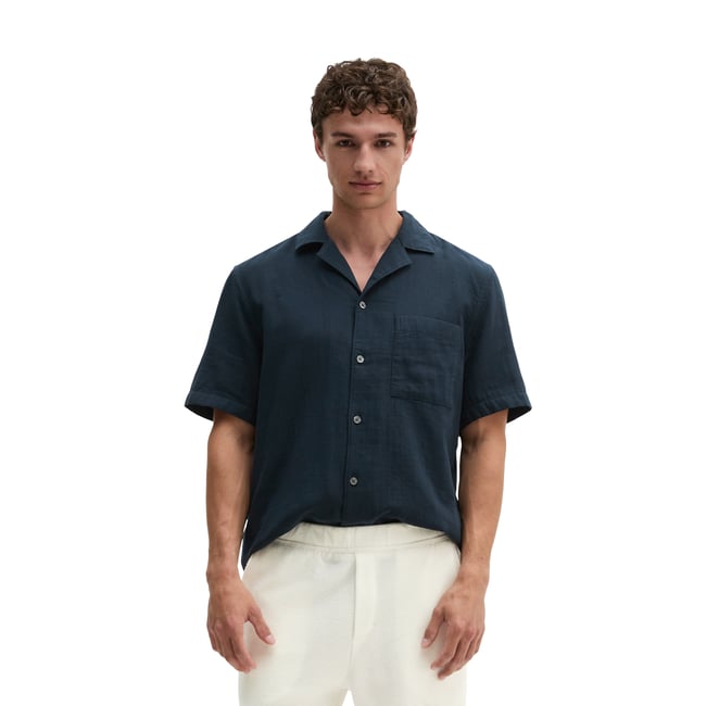 Chemise à manches courtes regular avec un léger effet froissé bleu foncé <span itemprop=