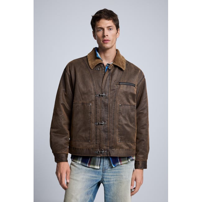 Veste matelassée effet cuir marron <span itemprop=