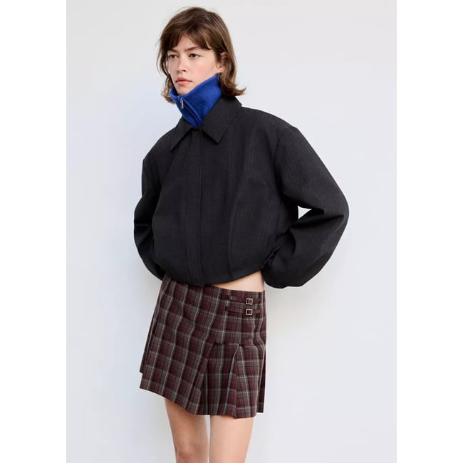 Jupe plissée détail boucles rouge <span itemprop=