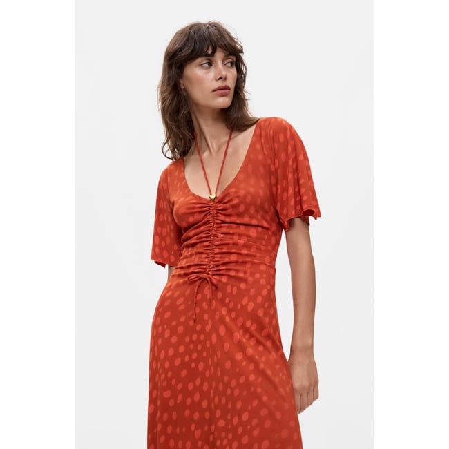 Robe midi à décolleté en V orange <span itemprop=