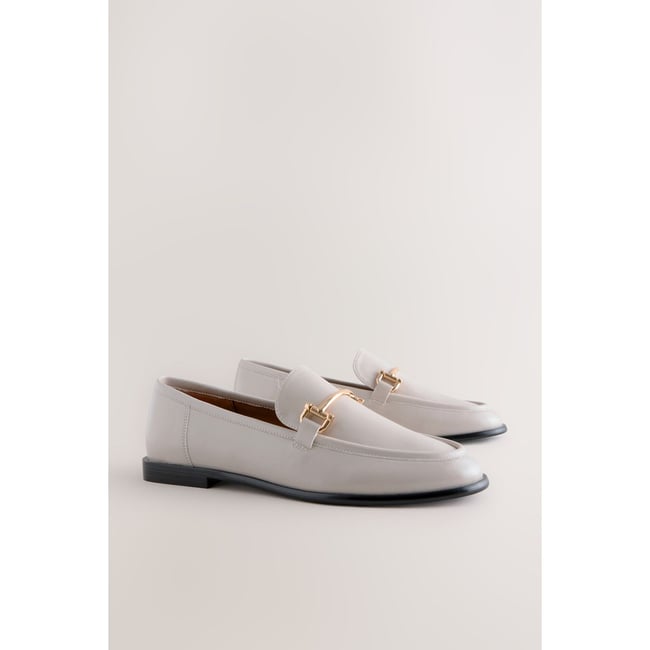 Mocassins à bout rond et liseré os <span itemprop=