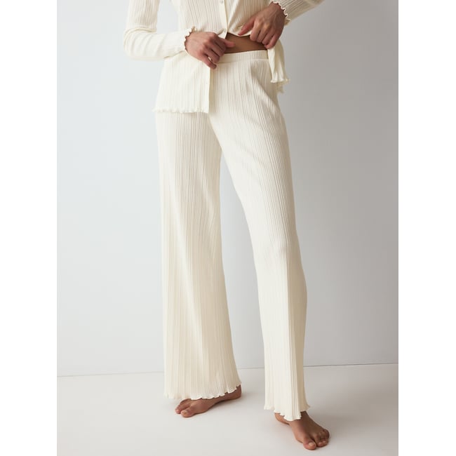 Pantalon en coton côtelé VERSATILE RIB blanc cassé <span itemprop=