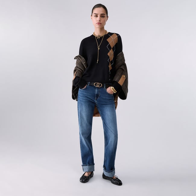 Pull avec intarsia géométrique noir <span itemprop=