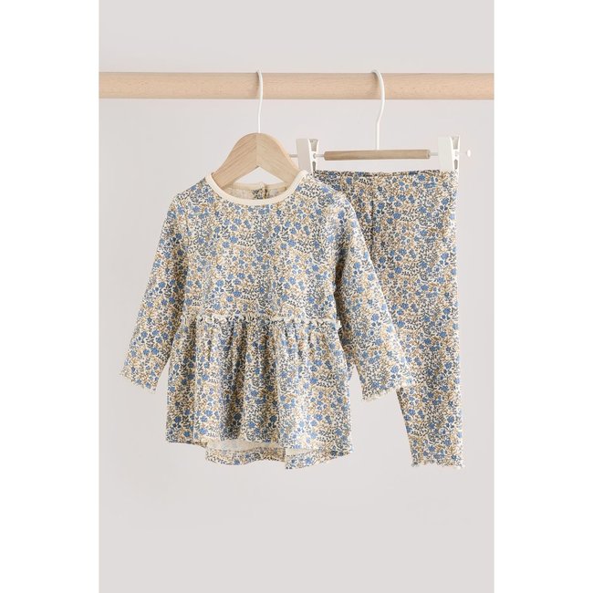 Haut à basque manches longues et legging petites fleurs bleues <span itemprop=