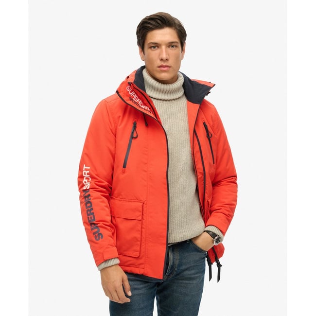 Coupe-vent à capuche Ultimate SD Windbreaker orange vif <span itemprop=