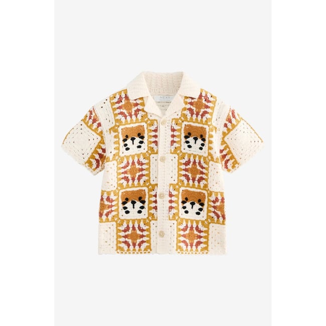 Polo manches courtes en crochet et col revers orange/tigre neutre <span itemprop=