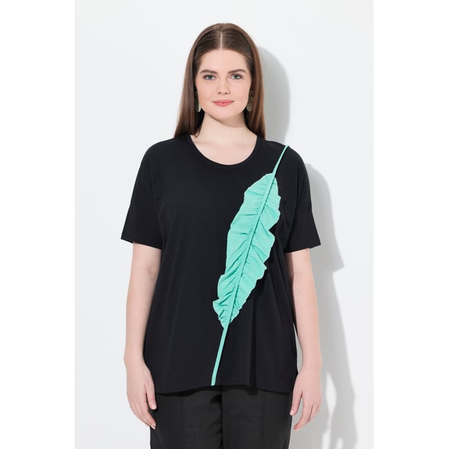 T-shirt oversize. Col rond et manches noir <span itemprop=