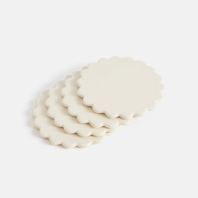 Lot de 4 dessous de verre, en grès, SHELLA Couleur blanc écru <span itemprop=