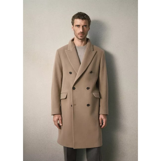 Manteau en mélange de laine vierge avec revers gris clair/pastel <span itemprop=