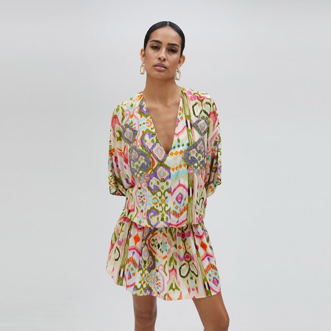 Robe courte à manches 3/4 style papillon jaune pâle <span itemprop=