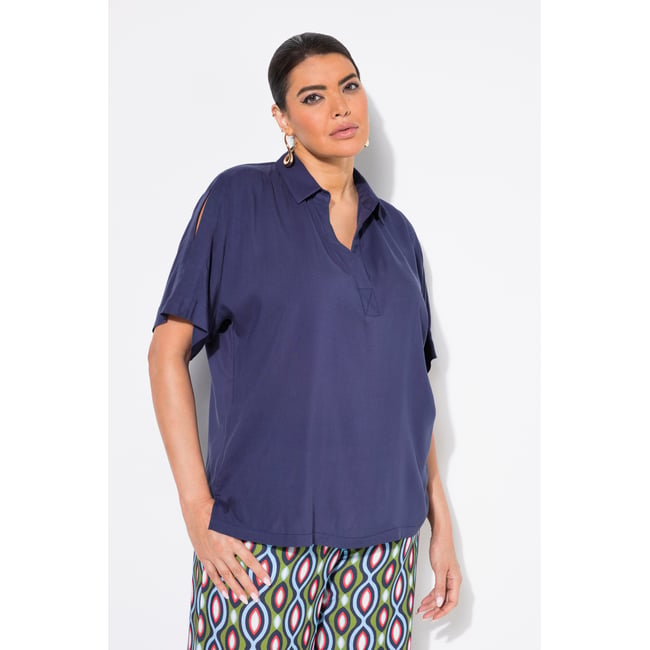 Blouse oversize. Col chemise et univers <span itemprop=