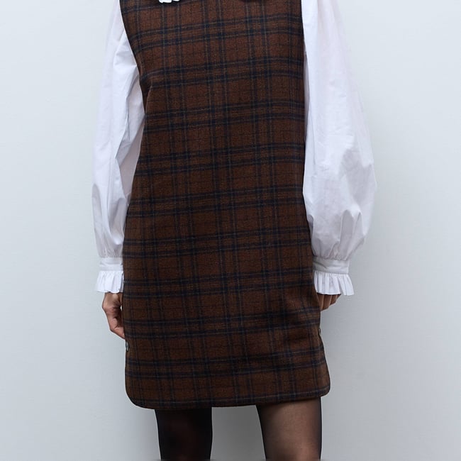 Robe courte sans manches contenant de la laine pudding <span itemprop=