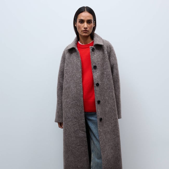 Manteau uni double boutonnage contenant de la laine elan <span itemprop=
