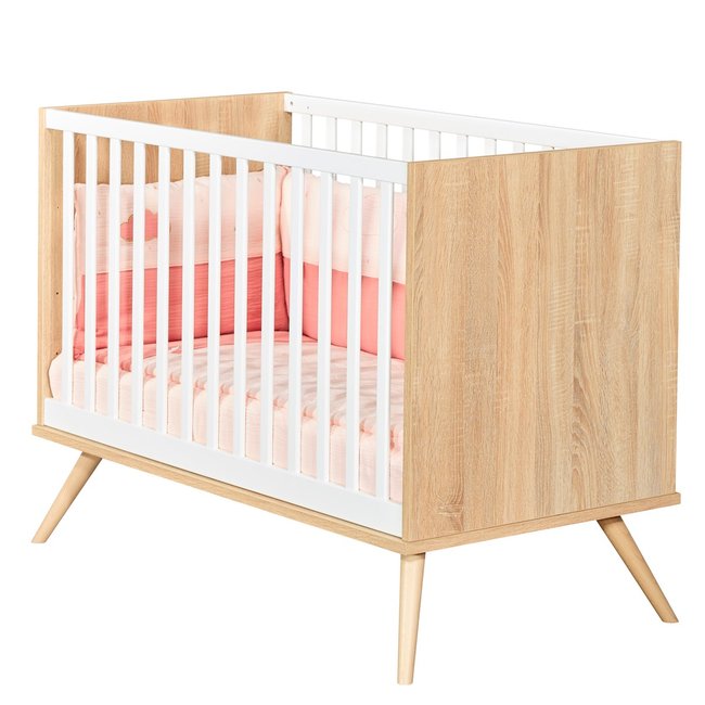 Lit bébé à barreaux en bois marron <span itemprop=
