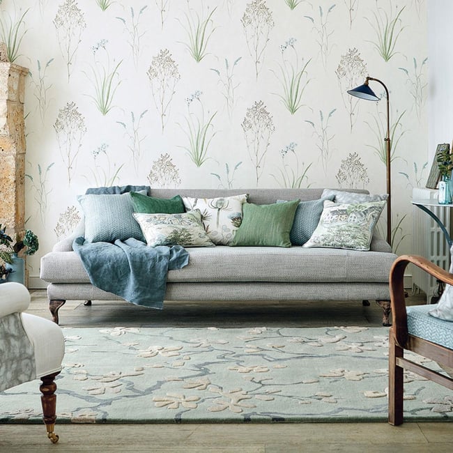 Tapis salon et chambre fait à la main en laine motif floral ANTHEA Couleur bleu gris <span itemprop=