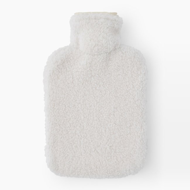 Bouillotte effet bouclette, 32x19.5cm, en polyester blanc <span itemprop=