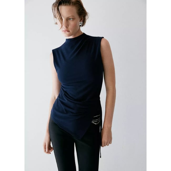 Top en maille bas asymétrique bleu marine <span itemprop=