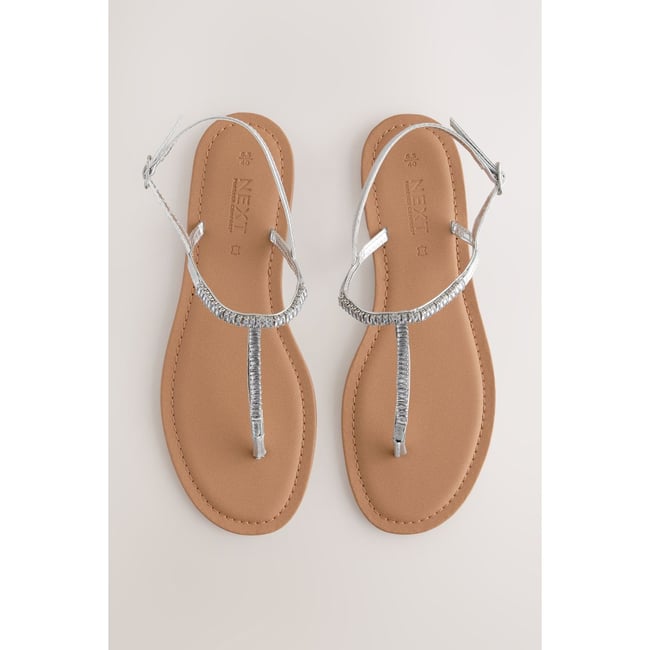 Sandales à entredoigt et finition bijou cuir argenté <span itemprop=