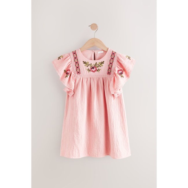 Robe brodée rose <span itemprop=