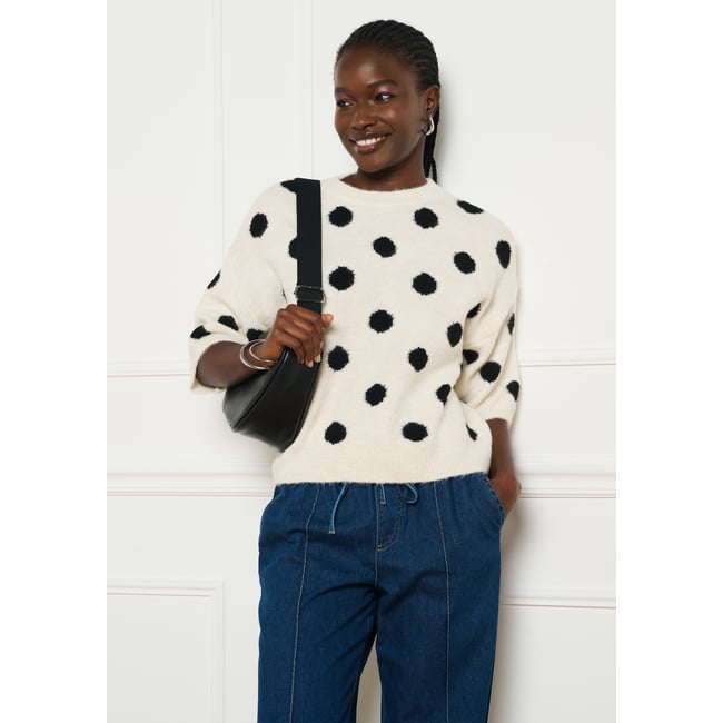 Pull jacquard à pois blanc vanille <span itemprop=
