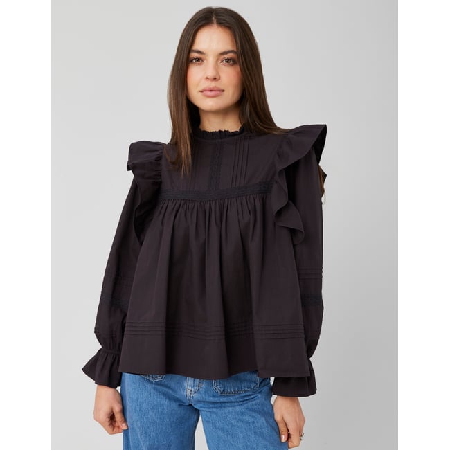 Blouse à volant noir <span itemprop=