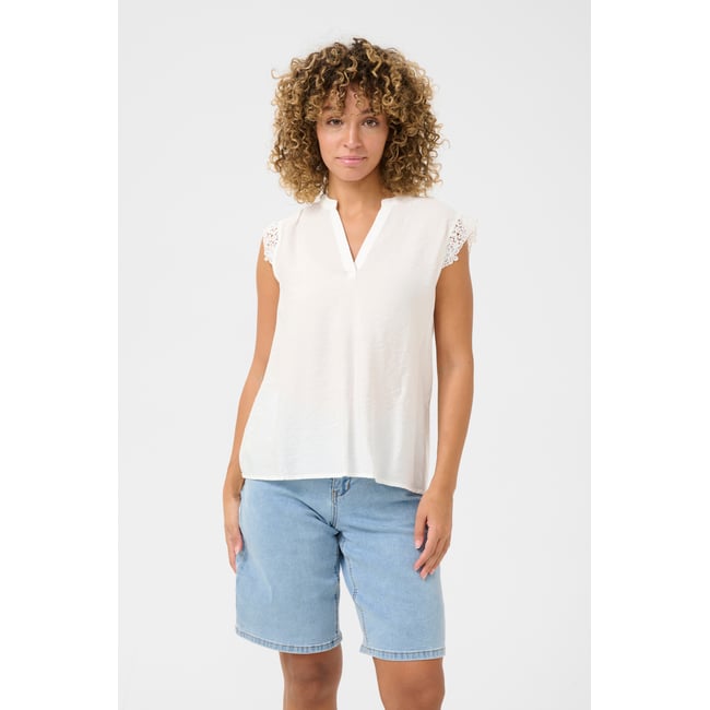 Sleeveless blouse blanc snow white <span itemprop=