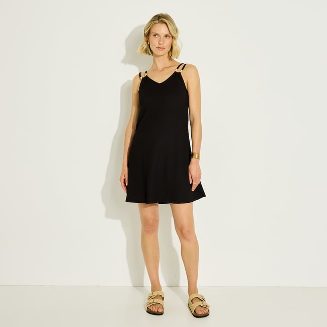 Robe courte unie fines bretelles noir <span itemprop=