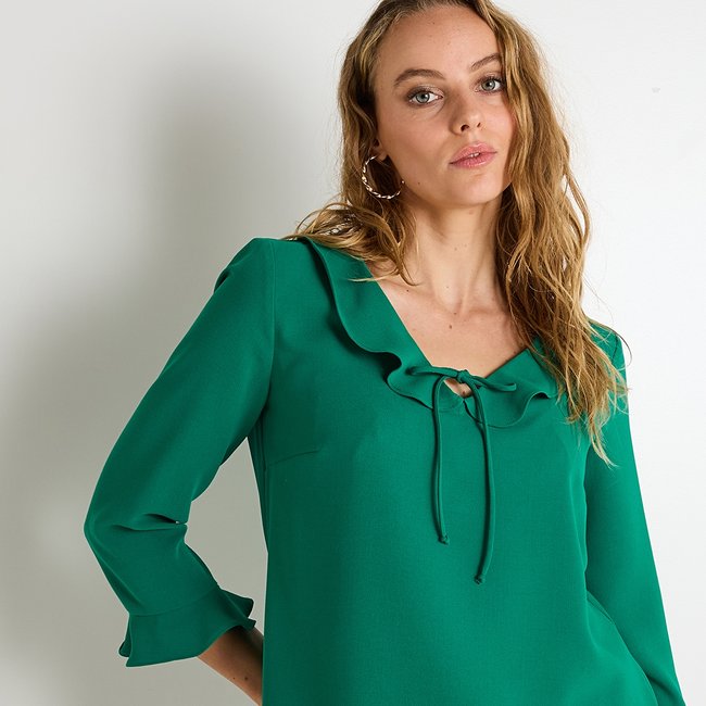 Blouse à volants vert <span itemprop=