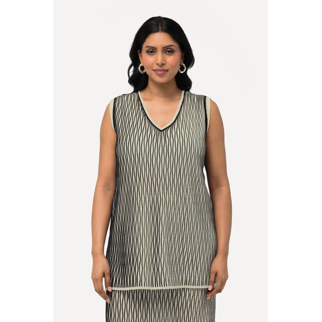 Débardeur en maille. Décolleté en V. Laine blanc cassé <span itemprop=