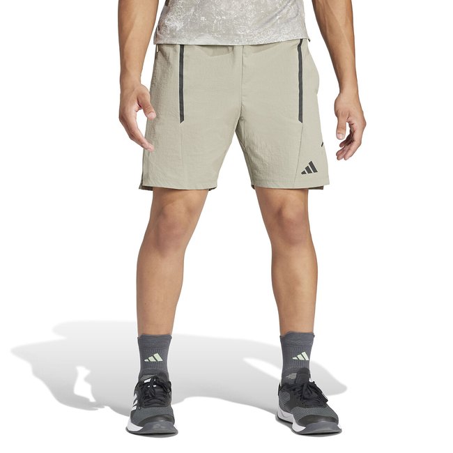 Short de training beige <span itemprop=