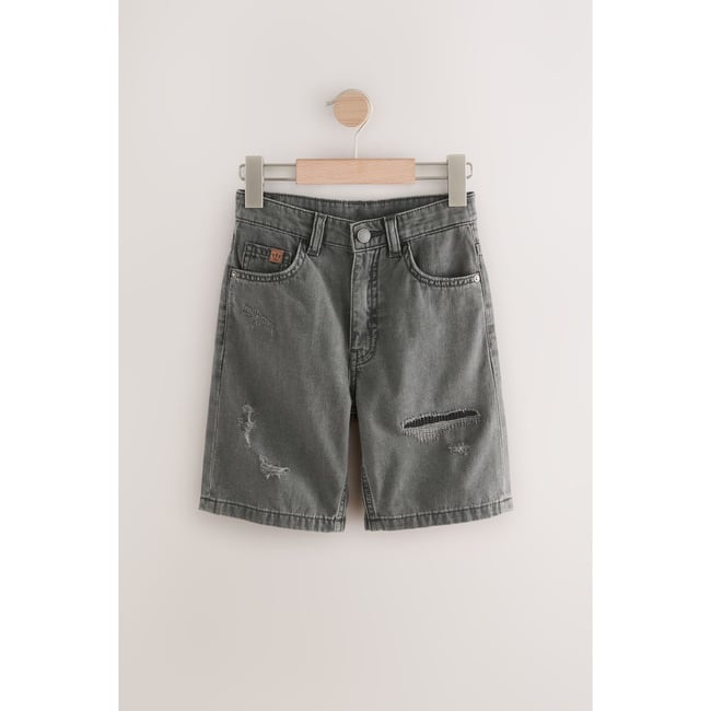 Short en jean large authentique noir vieilli <span itemprop=