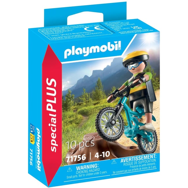 Cycliste avec vélo tout terrain et souche d'arbre v019845 <span itemprop=