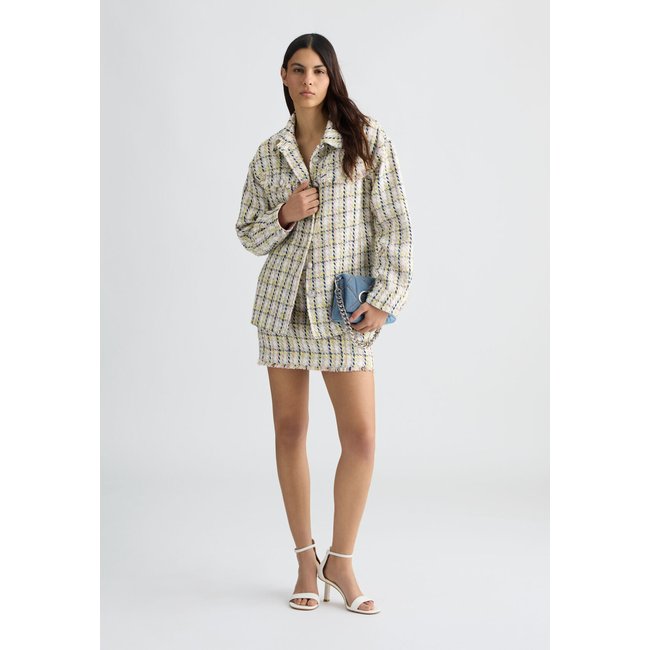 Minijupe en bouclette blanc <span itemprop=