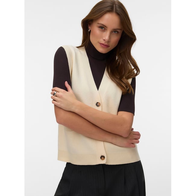 Chaleco con cuello de pico crudo <span itemprop=