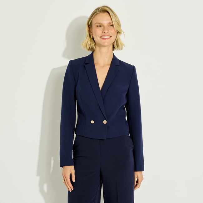 Blazer court cintré bleu marine <span itemprop=
