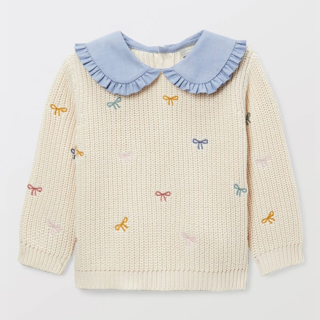 Pull brodé à col chambray en coton naturel <span itemprop=