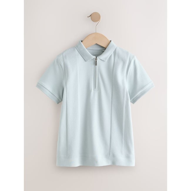 Polo texturé à col zippé et manches courtes bleu <span itemprop=