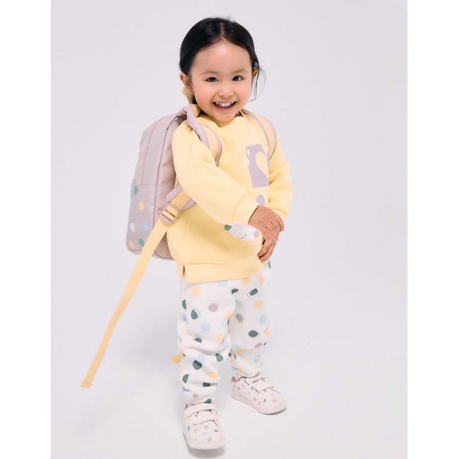 Pantalon en molleton avec doublure en coton peigné et motif à pois blanc <span itemprop=