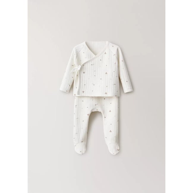 Combinaison pyjama imprimée blanc cassé <span itemprop=