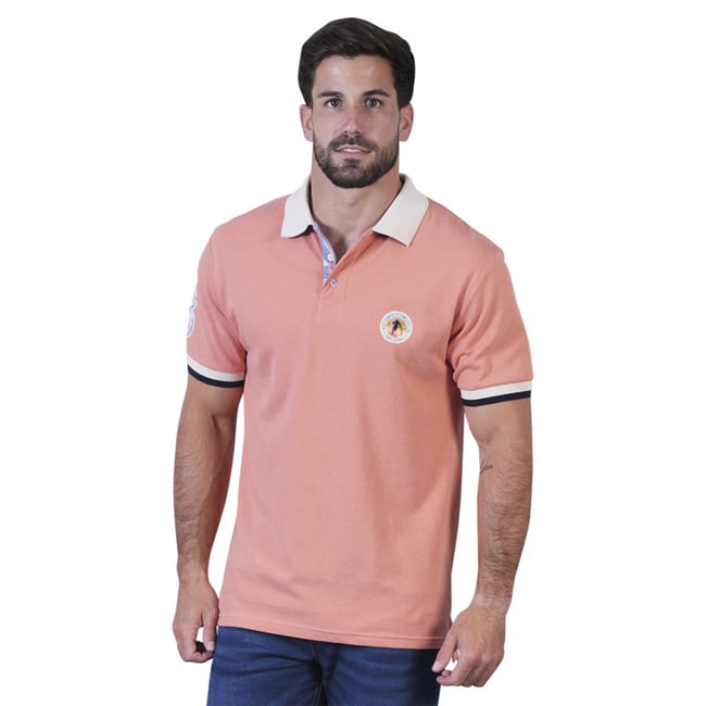 Polo en coton biologique corail uni pourvu d'un col boutonné rose <span itemprop=