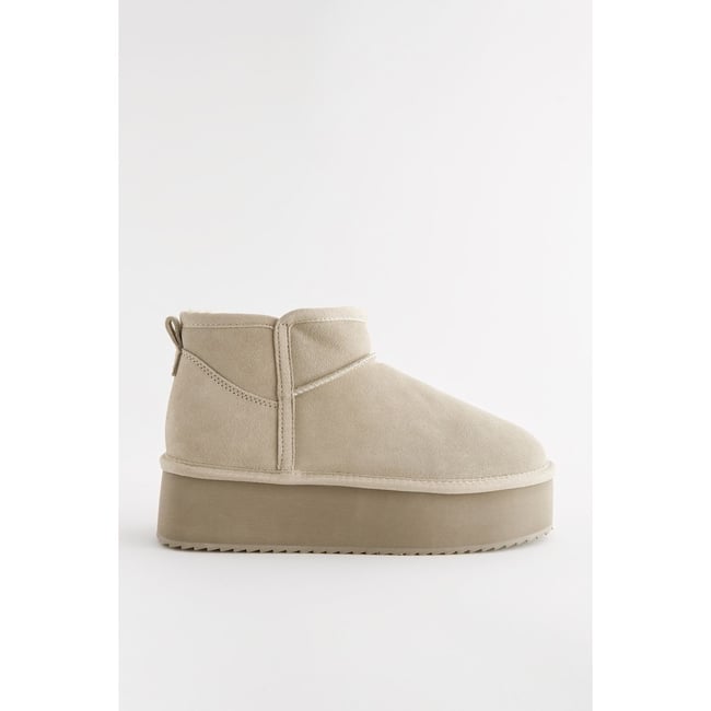 Bottes doublées à semelles compensées naturel <span itemprop=