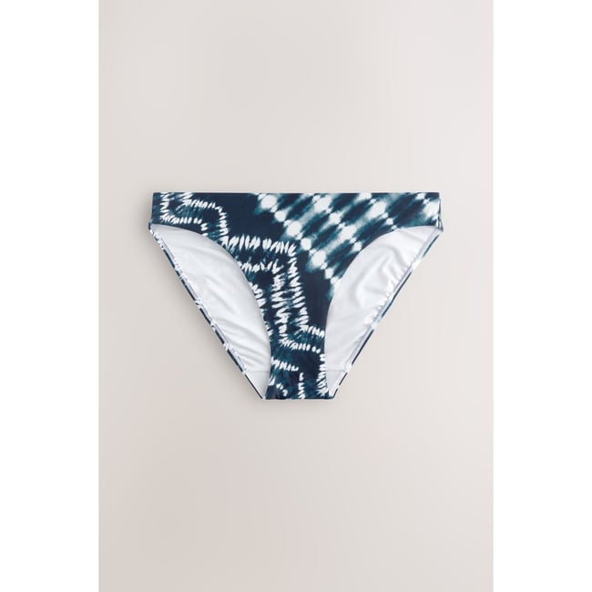 Bas de bikini échancré teinture cravate bleu marine <span itemprop=