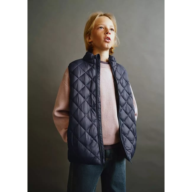Gilet matelassé losanges bleu marine <span itemprop=