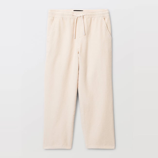 Pantalon taille élastiquée uni contient du coton naturel <span itemprop=